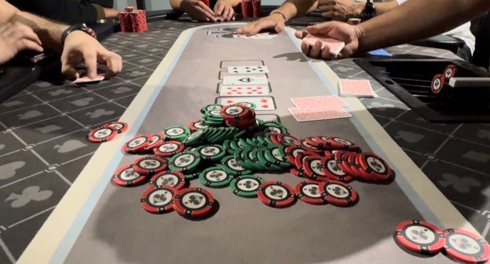 Live poker game with professional NVP chips